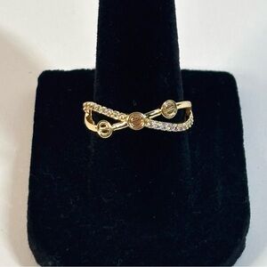 18k yellow gold-plated criss-cross band ring